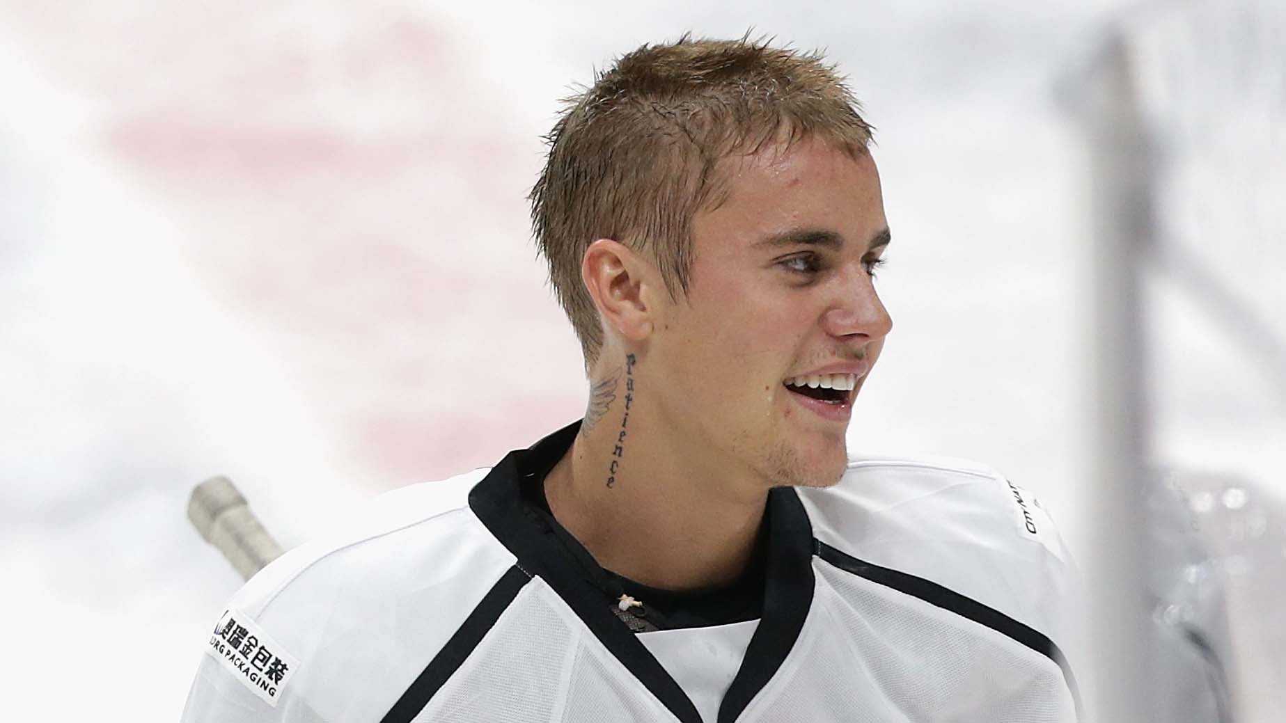 Justin Bieber Takes Brother Jaxon to Play Hockey With NHL Stars