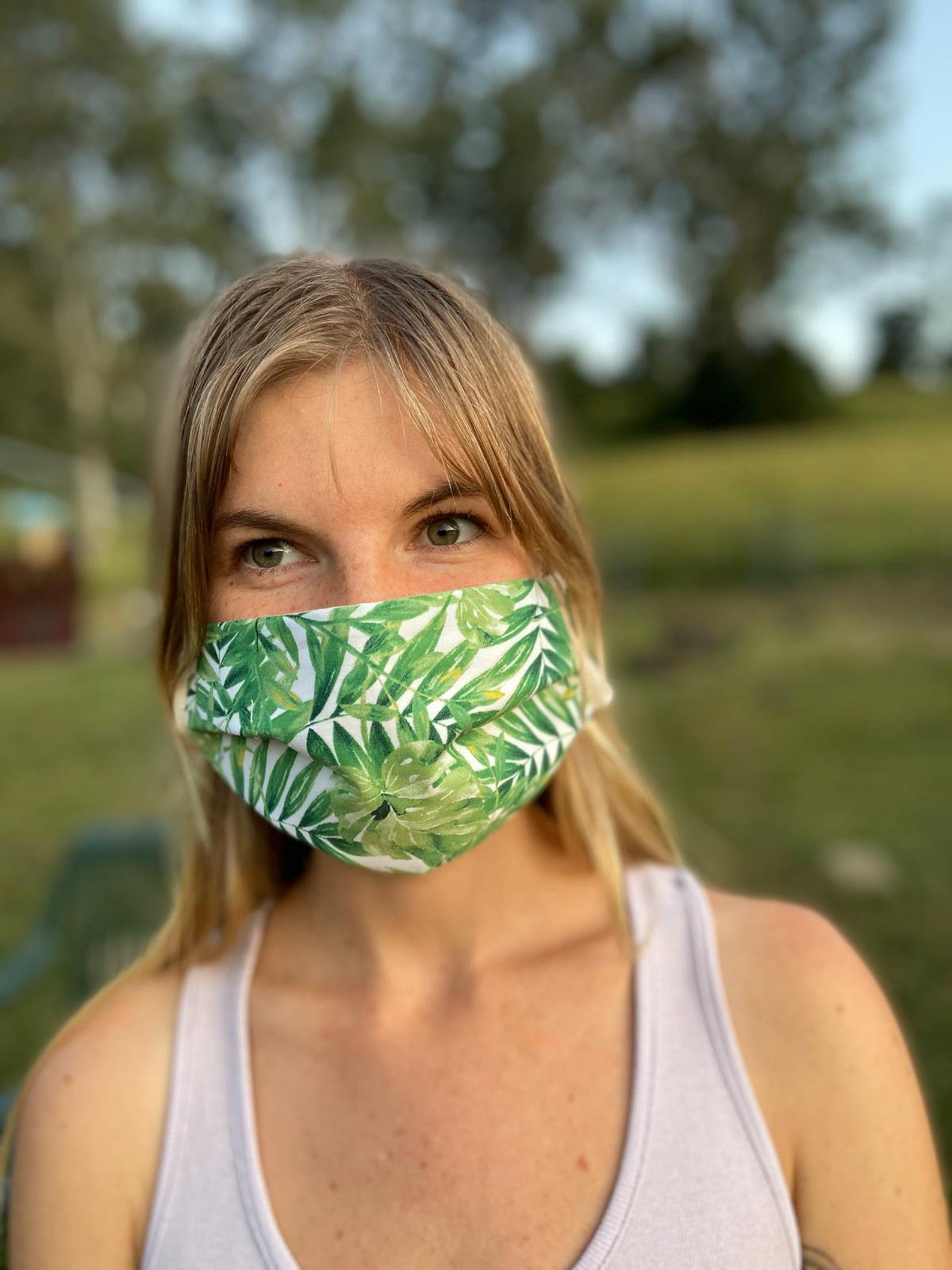 https://www.etonline.com/sites/default/files/images/2020-04/leaf_print_protective_face_mask.jpg