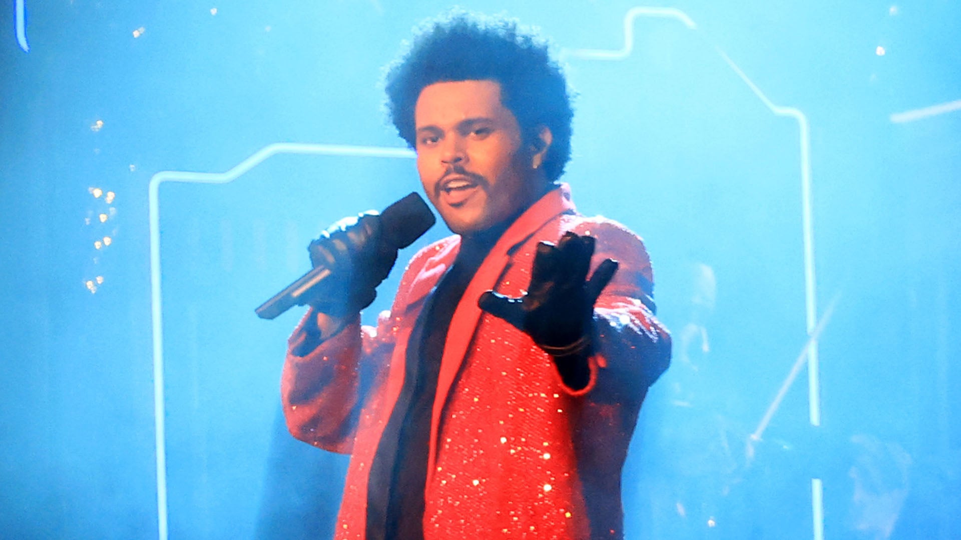 The Weeknd's Super Bowl Halftime Show Explained: The Meaning Behind the  Bandages and His 'After Hours' Era
