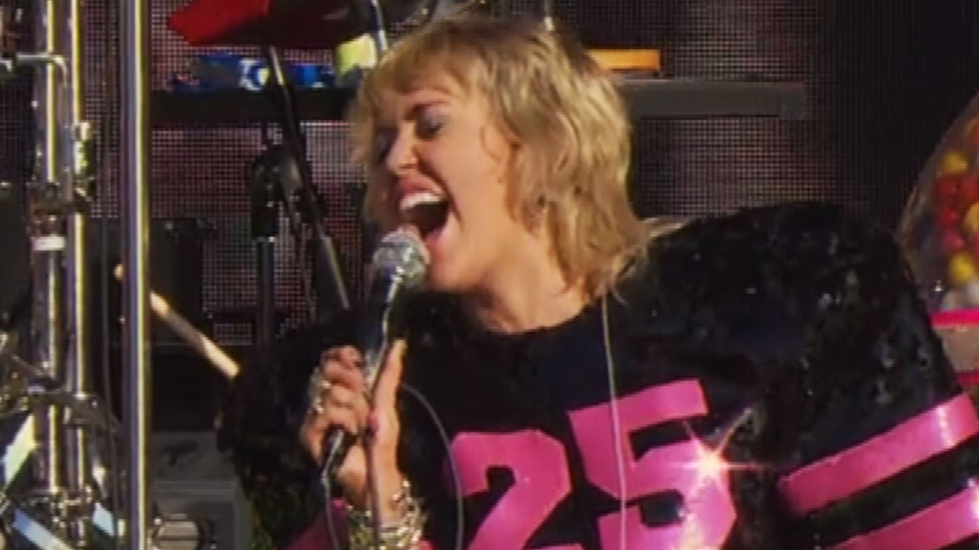 Miley Cyrus Flashes 'Free Britney' Sign During Lollapalooza Set