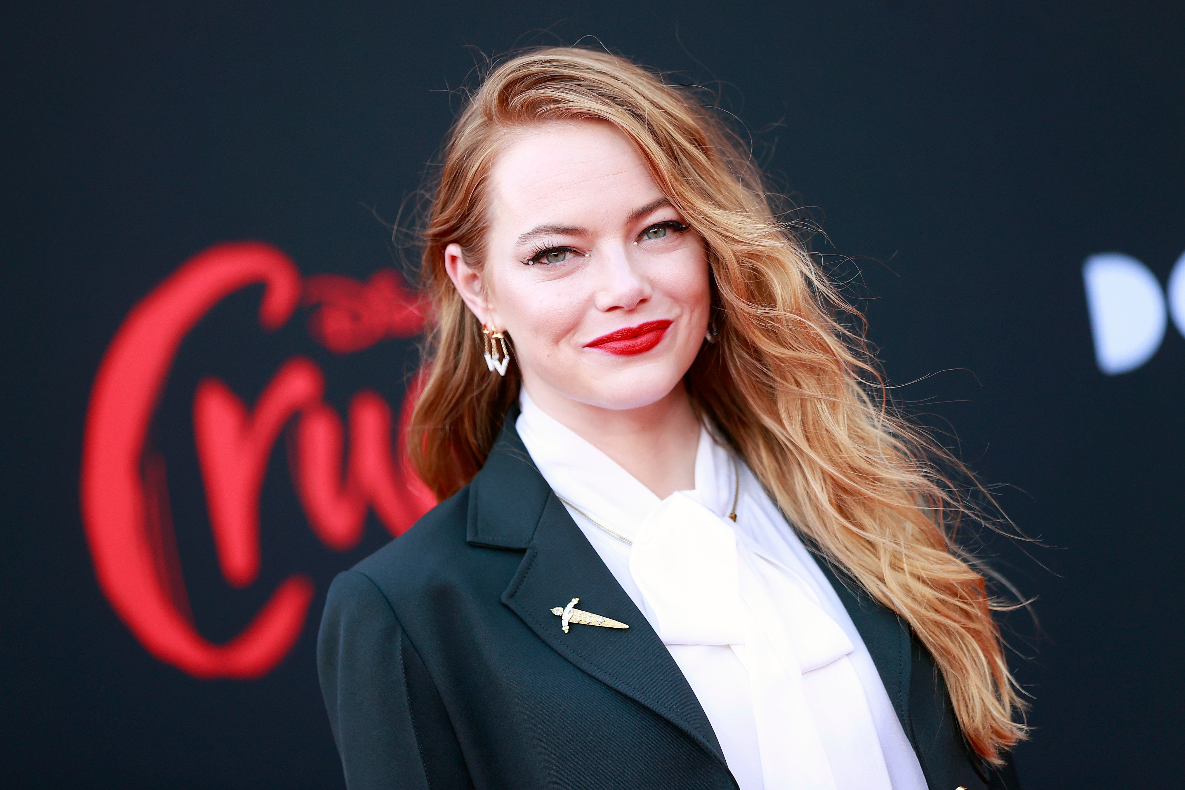 Emma Stone Rocks Chic Pantsuit at 'Cruella' Premiere in First Red