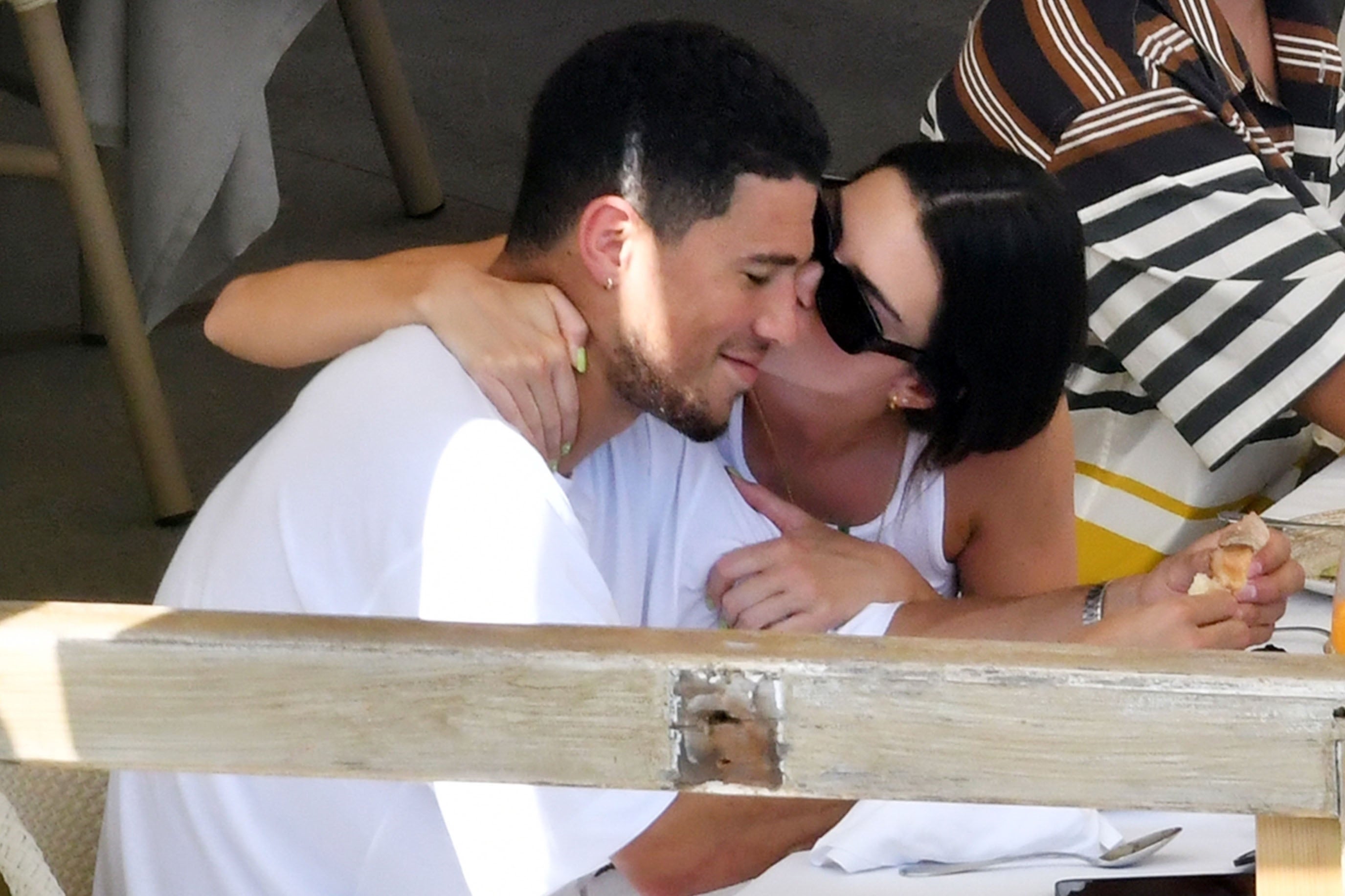 Kendall Jenner Gives Boyfriend Devin Booker a Sweet Kiss During Italian Vacation image