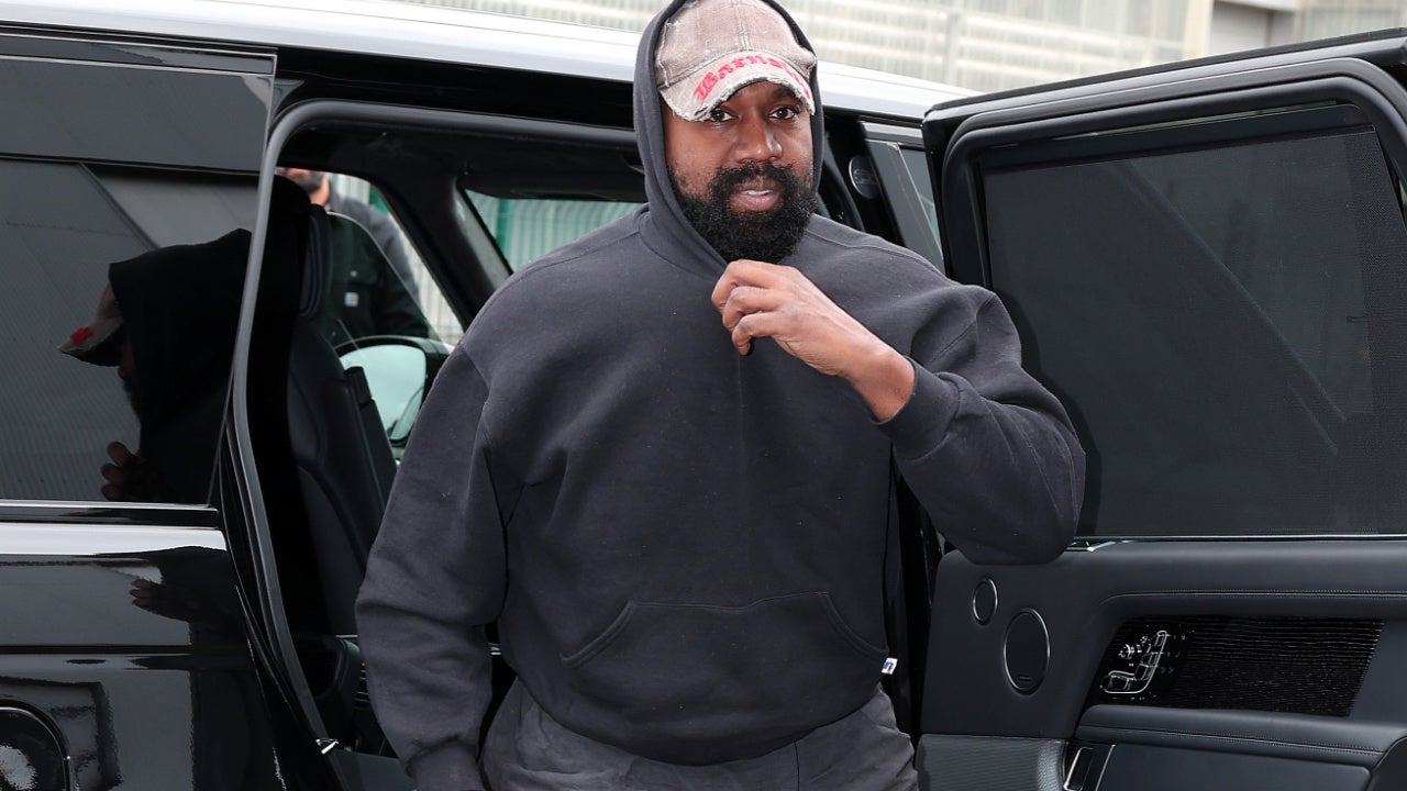 Kanye West Arrives at Balenciaga Fashion Show with Children Ahead 