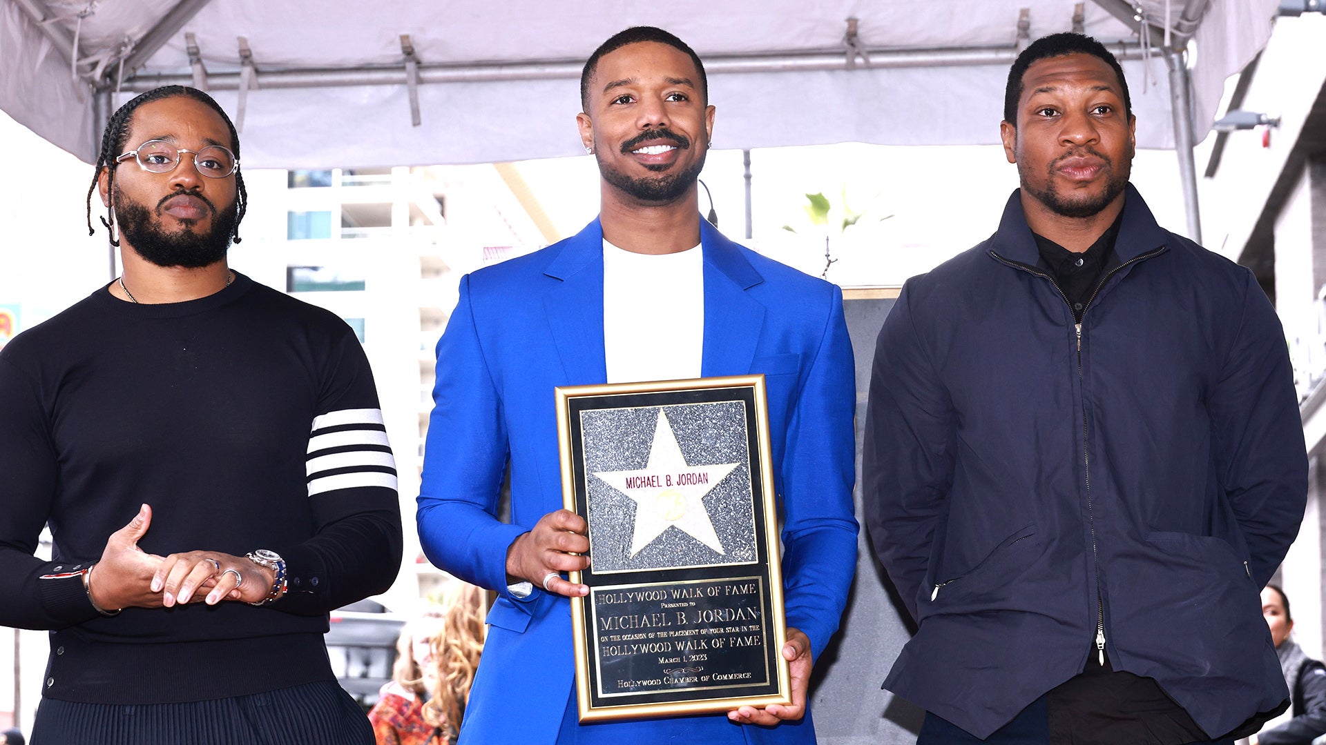 Michael B. Jordan Hugs It Out With Jonathan Majors at 'Creed III