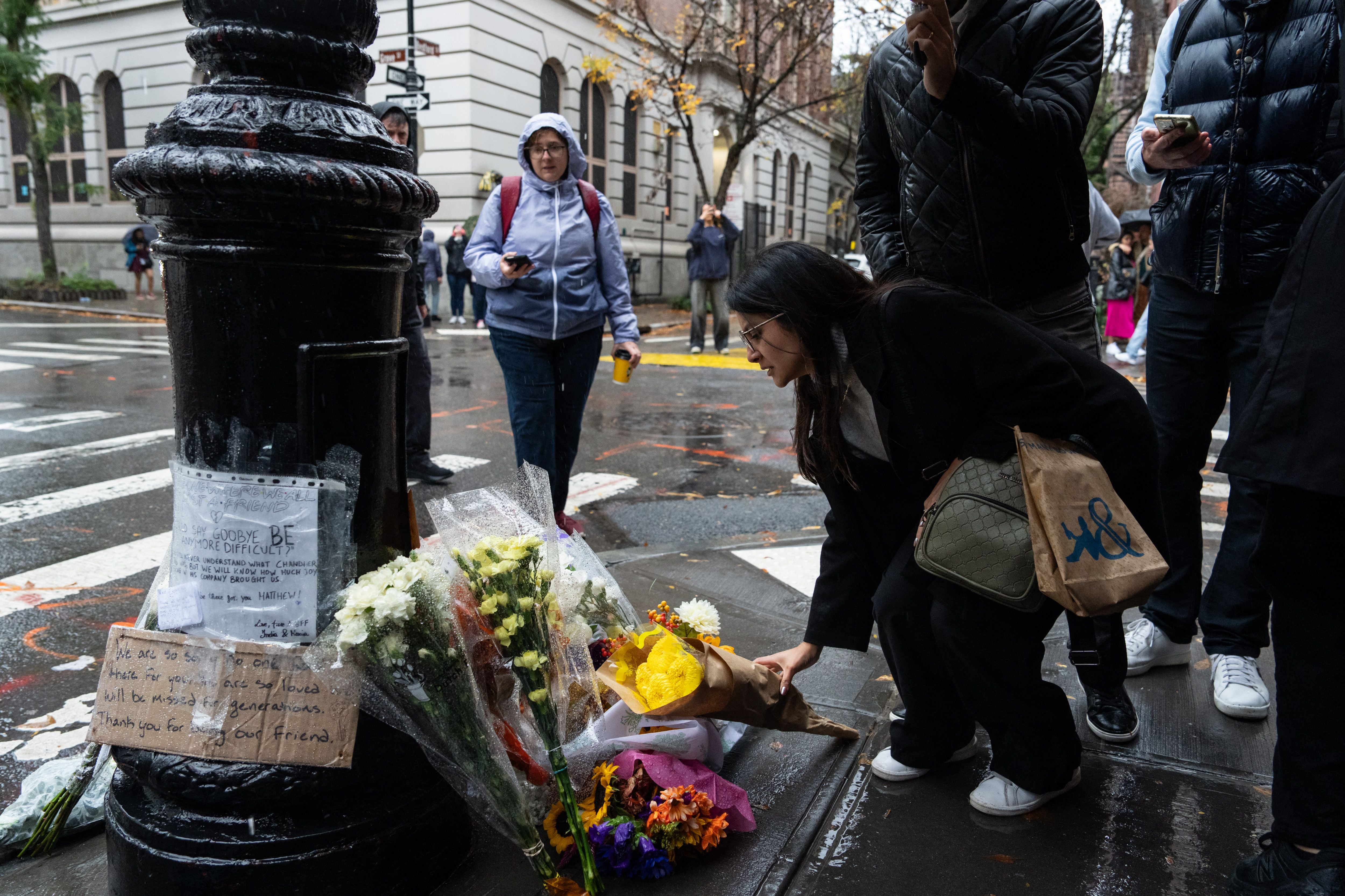 Because you were there for me too Fans of Matthew Perry leave flowers  outside iconic Friends 'apartment' in NYC - as wellwishers place tributes  outside the LA home where he was found