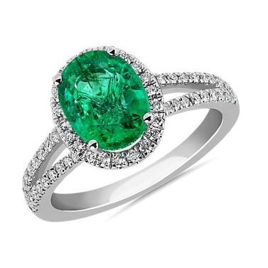 Oval Emerald And Diamond Halo Split Shank Ring