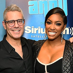 Andy Cohen and Porsha Williams pose for photos at Radio Andy SiriusXM Studios on April 29, 2019 in New York City.