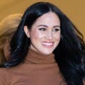 Meghan Markle Is All Smiles During Stroll With Archie After Royal Exit