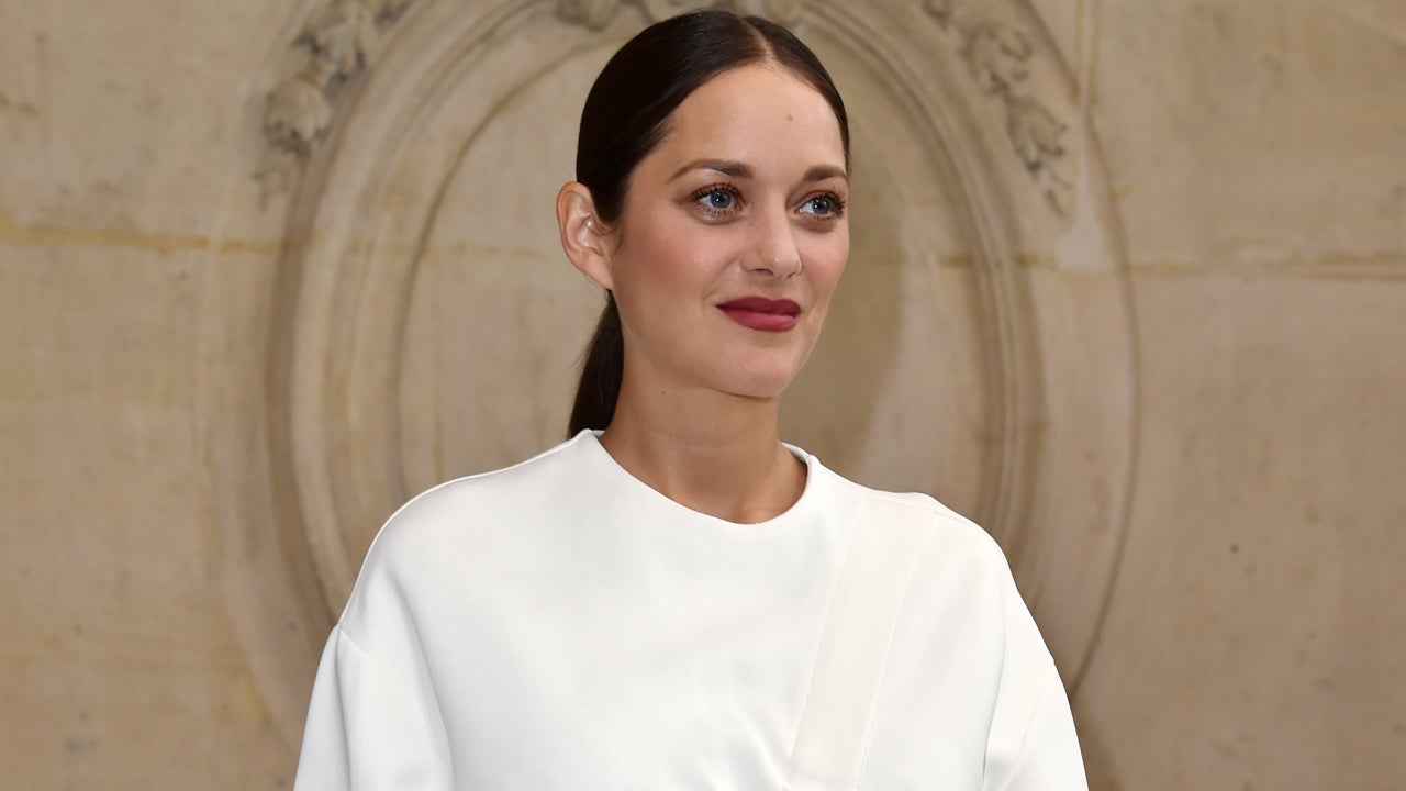 Marion Cotillard Debuts Her Baby Bump at Christian Dior Show During