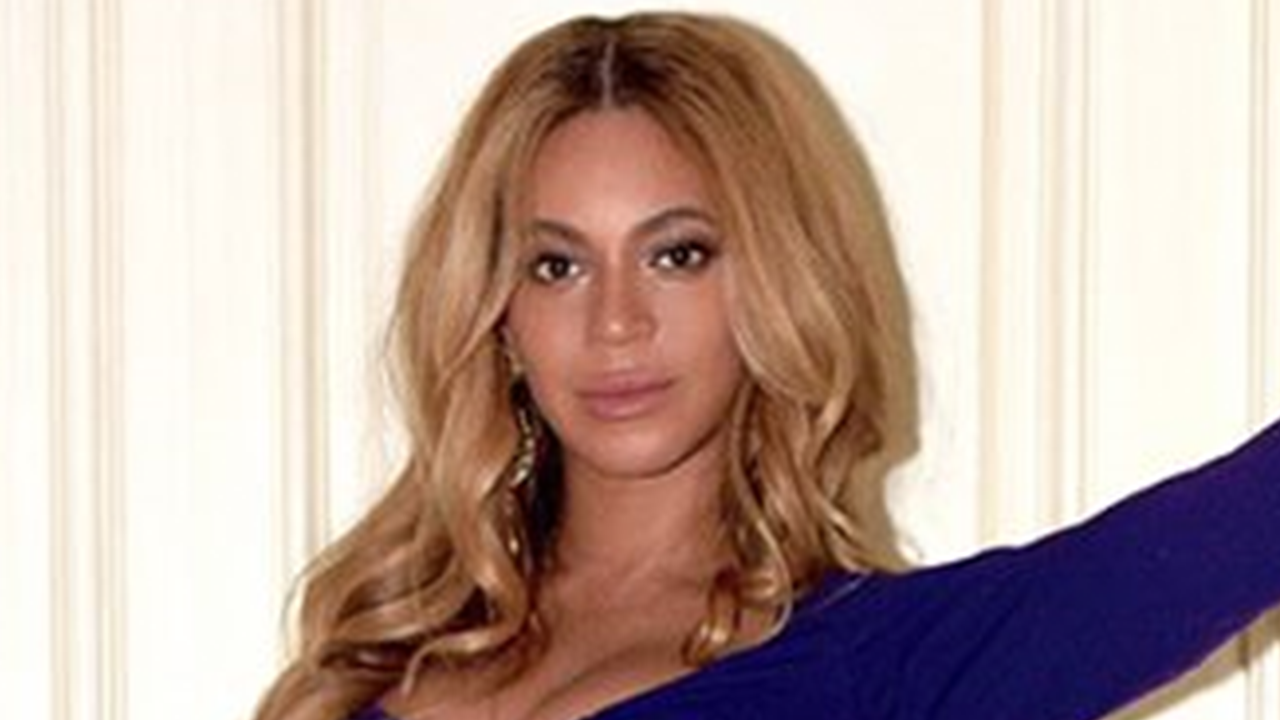 Beyonce Slays in Plunging, Skintight Gown, as Blue Ivy Hugs Her Baby