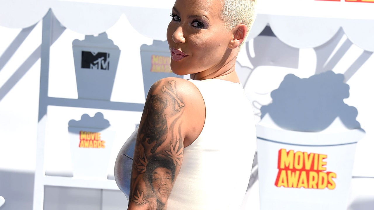 Amber Rose Covers Up Her Wiz Khalifa Tattoo With Another Man's Face ...
