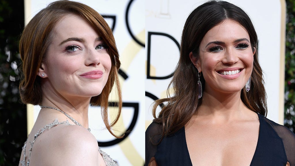 Emma Stone and Mandy Moore at 2017 Golden Globe Awards