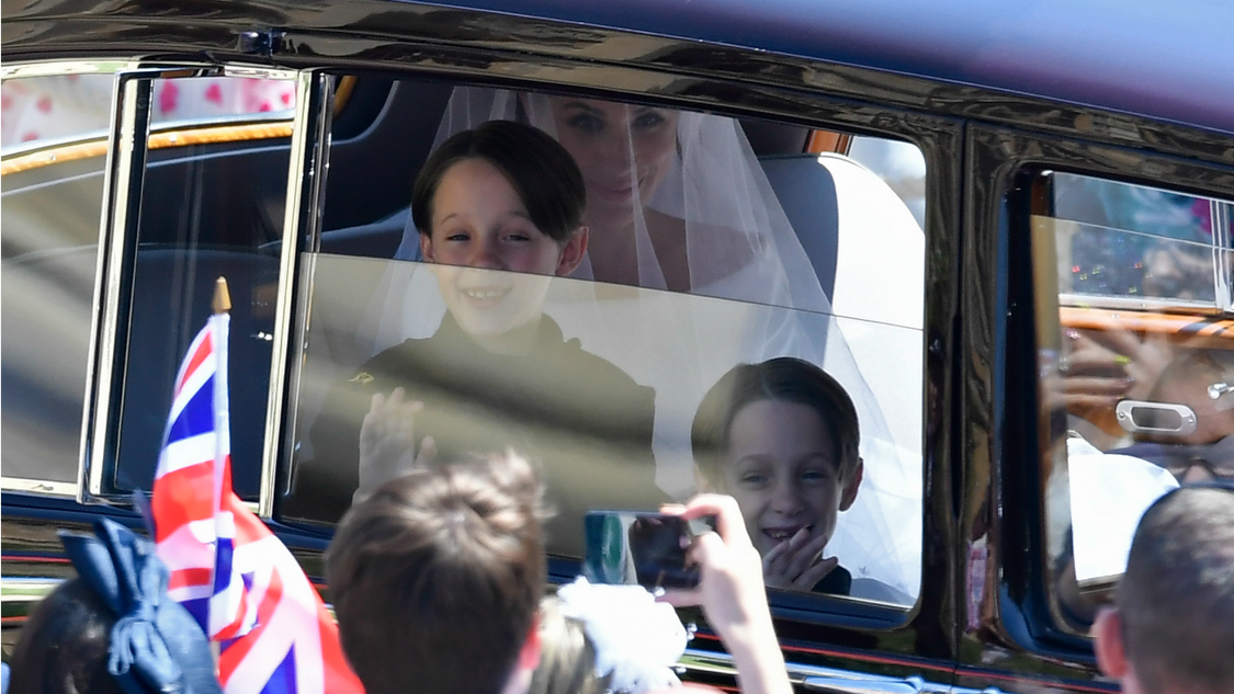 Meghan Markle is driven to St George's Chapel in Windsor Castle along with her page boys Brian and John Mulroney at St George's Chapel at Windsor Castle before the wedding of Prince Harry to Meghan Markle on May 19, 2018 in Windsor, England.