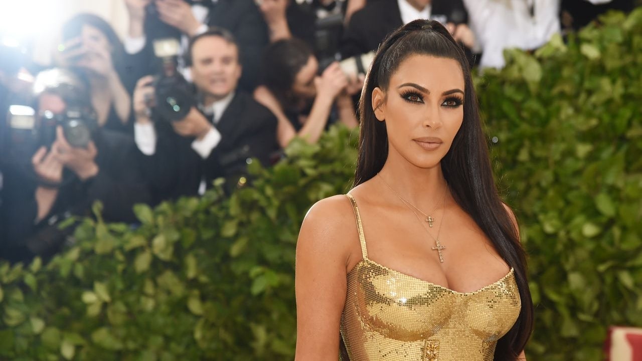 kim kardashian gold cross dress Is a Golden Goddess at Met Gala 2018 burgundy evening dress