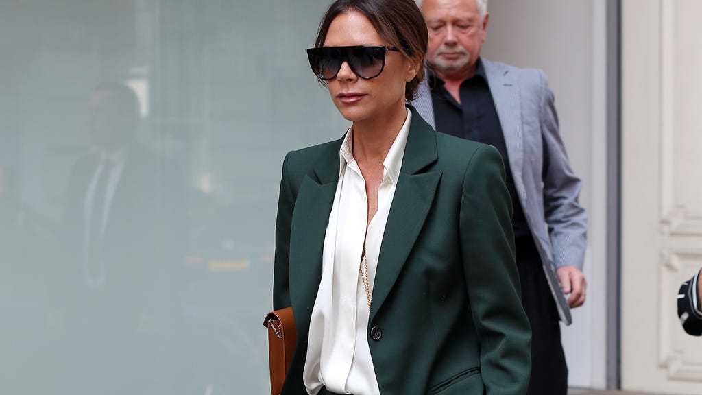 Victoria Beckham in green suit