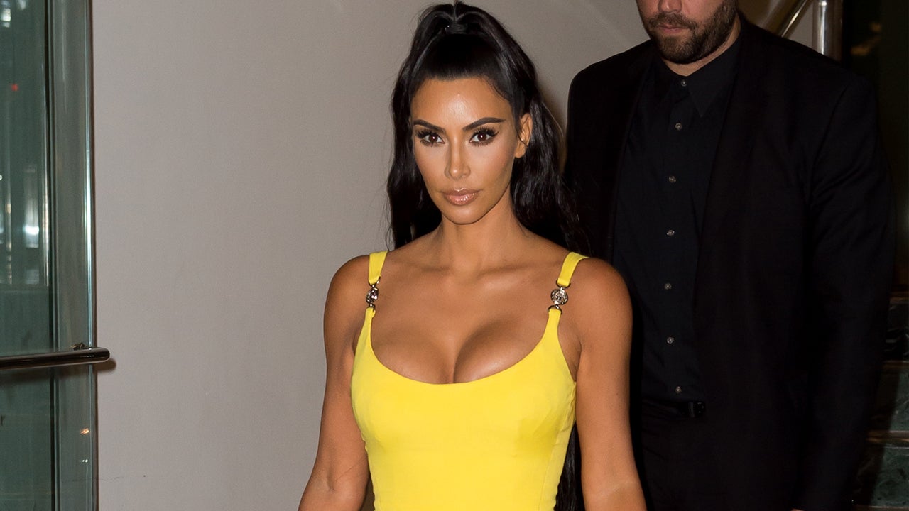 Kim Kardashian Stuns in Skintight Canary Yellow Mini Dress With