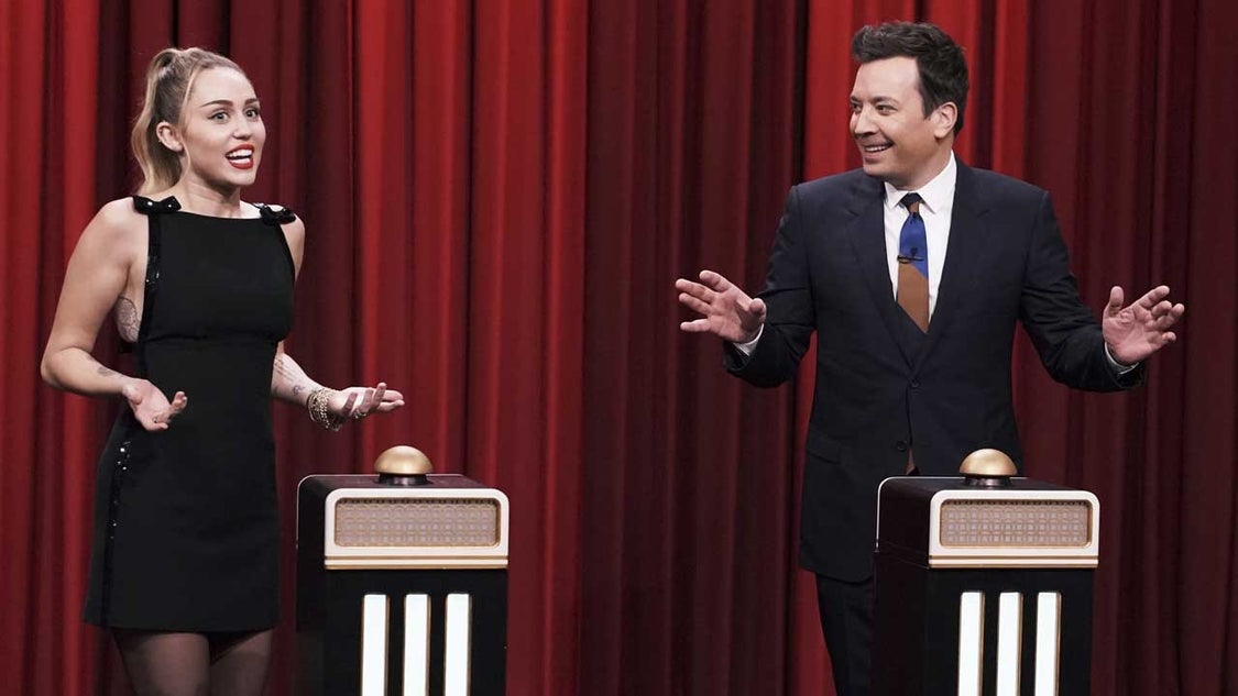 Miley Cyrus and Jimmy Fallon play a game on the 'Tonight Show' on Dec. 13