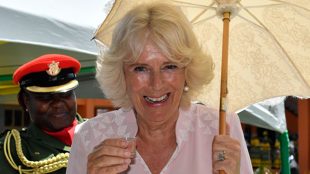 Camilla, Duchess of Cornwall, Enjoys a Shot of Rum During Royal Tour of