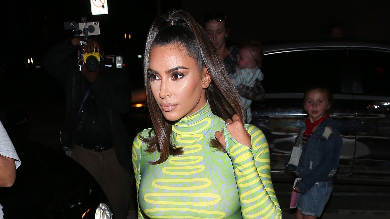 kim kardashian green mini dress Of Course Kim Kardashian West Is Wearing a Party Dress at Home
