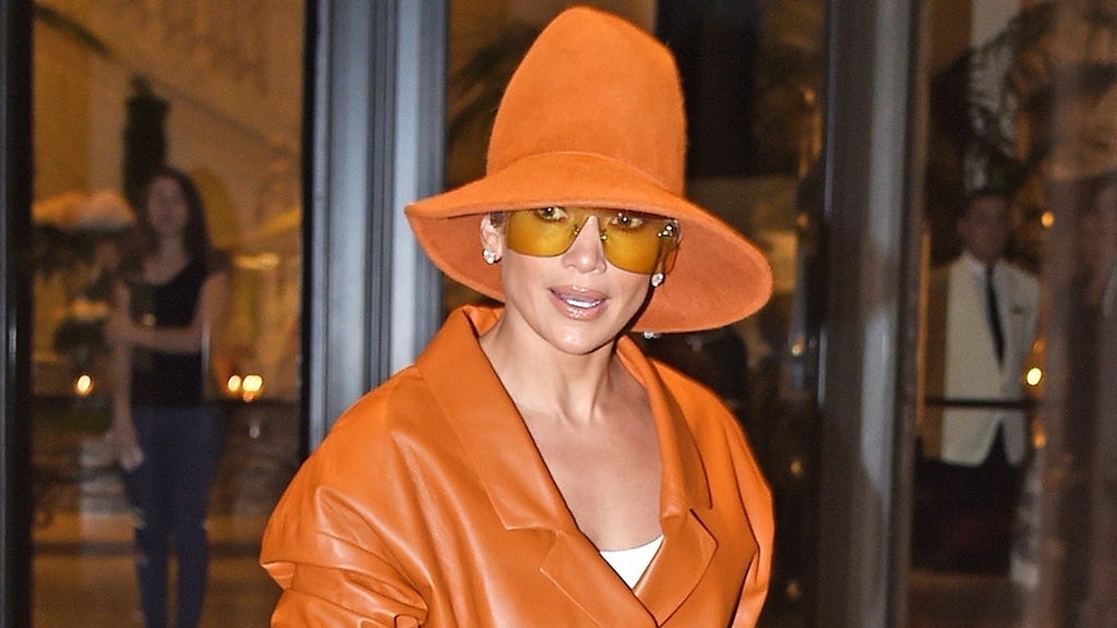 Jennifer Lopez giant orange hat 1280
