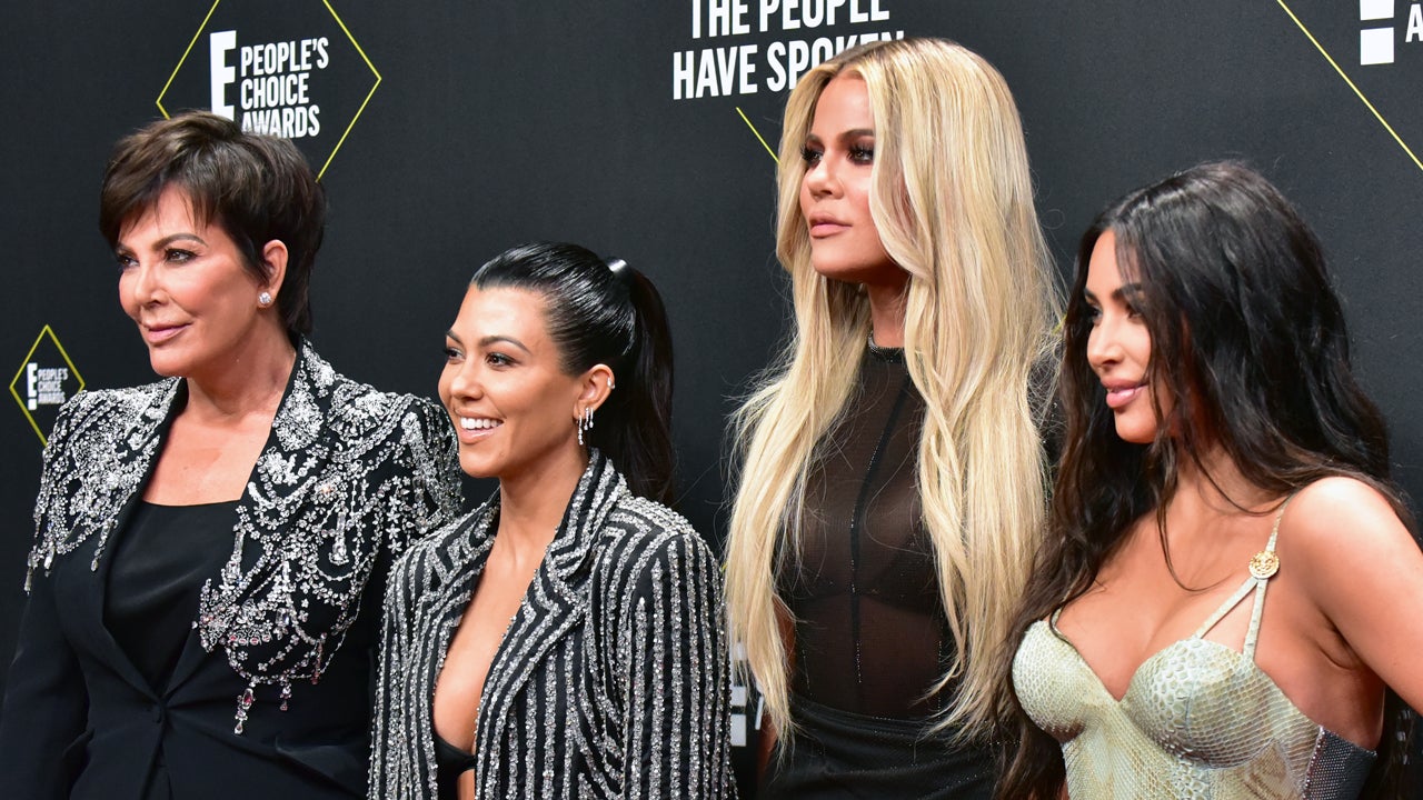 Kim Kardashian goes without underwear in skintight silk dress as