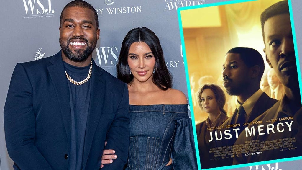 Kanye West and Kim Kardashian with 'Just Mercy' Poster
