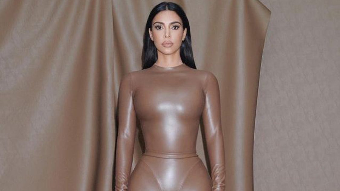Kim Kardashian's Skims faux leather bodysuit and shorts