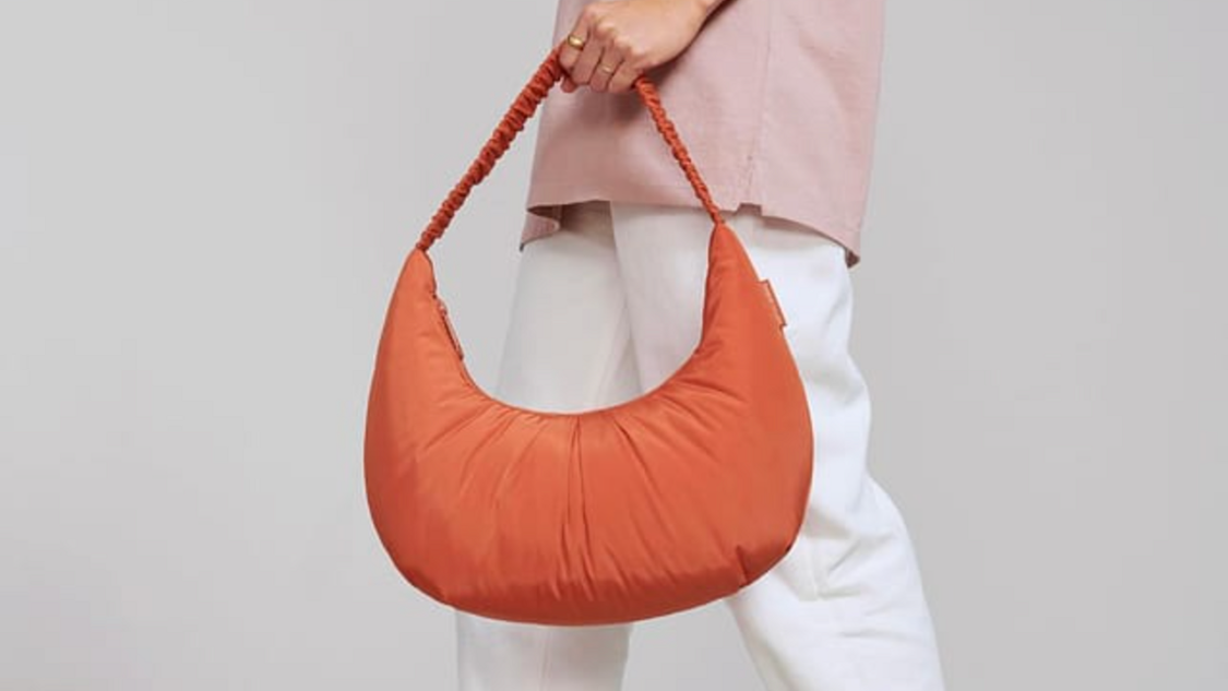 Dagne Dover's new bag collection is the pop of color your wardrobe needs