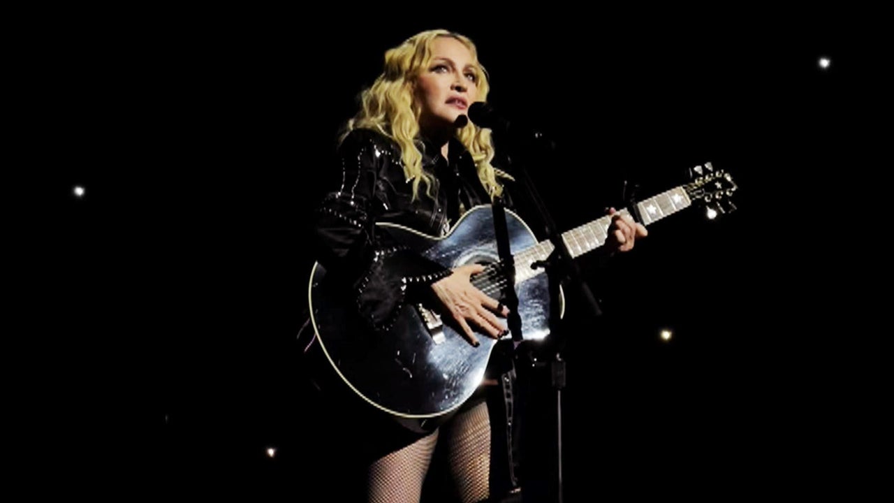 Madonna Takes a Tumble Onstage After She's Dropped By a Dancer ...