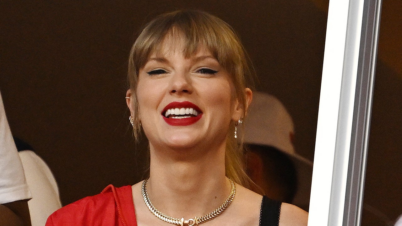 Taylor Swift Fan Brings Travis Kelce Cardboard Cutout to 'Eras
