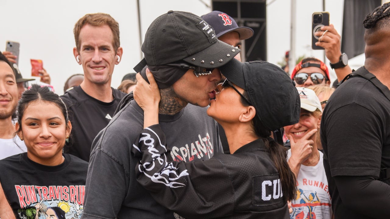 Kourtney Kardashian Kisses Travis Barker After He Completes Race