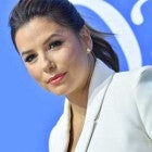 Eva Longoria (left) alongside migrant family at the U.S.-Mexico border