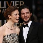 Kit Harington and Rose Leslie pose on the red carpet upon arrival to attend the 2016 Laurence Olivier Awards in London on April 3, 2016.