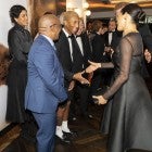 Prince Harry, Duke of Sussex and Meghan, Duchess of Sussex greet US singer Pharrell Williams at the European Premiere of Disney's "The Lion King" at Odeon Luxe Leicester Square on July 14, 2019 in London, England.