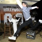 Bra Pitt Photobombs Margot Robbie