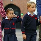Princess Charlotte of Cambridge, with her brother, Britain's Prince George of Cambridge, arrives for her first day of school at Thomas's Battersea in London
