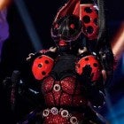 The Ladybug and host Nick Cannon on 'The Masked Singer'