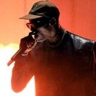 Travis Scott at the 2019 AMAs with Kylie Jenner (inset)