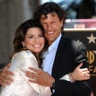 Shania Twain poses with her husband, Frederic Nicolas Thiebaud, after being honored by a Star on the Hollywood Walk of Fame in Hollywood, California on June 2, 2011. 