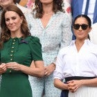 Catherine, Duchess of Cambridge and Meghan, Duchess of Sussex in the Royal Box on Centre Court during day twelve of the Wimbledon Tennis Championships at All England Lawn Tennis and Croquet Club on July 13, 2019 in London, England. 