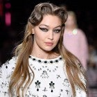 Gigi Hadid walks the runway at the Miu Miu Ready to Wear fashion show 