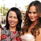 Model Chrissy Teigen (R) and Vilailuck Teigen attend the 2014 MTV Movie Awards at Nokia Theatre L.A. Live on April 13, 2014 in Los Angeles, California.