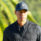 Tiger Woods looks on from the 18th hole during the final round of The Genesis Invitational golf tournament at the Riviera Country Club in Pacific Palisades, CA on February 21, 2021. The tournament was played without fans due to the COVID-19 pandemic.