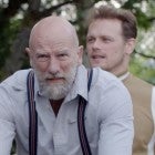 Watch Sam Heughan and Graham McTavish Hilariously Ride a Tandem Bike on 'Men in Kilts' (Exclusive)