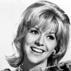 Arlene Golonka plays with her necklace in publicity portrait for the film 'Penelope', 1966.