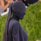 Kim Kardashian Shows Up to 2021 Met Gala Covered Head to Toe in Black