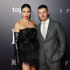Adriana Lima and Andre Lemmers pose on the red carpet. 