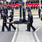 Police Officer Collapses During Queen's Funeral 