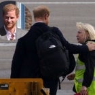 Prince Harry comforts worker