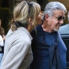 Jennifer Flavin almost plants a kiss on Sylvester Stallone in Midtown Manhattan.